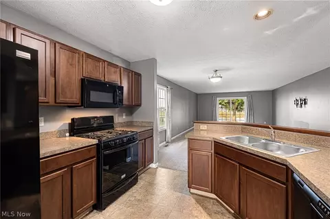 Kitchen - 213 Westminster Way, Elyria, OH 44035 photo 1 of 2