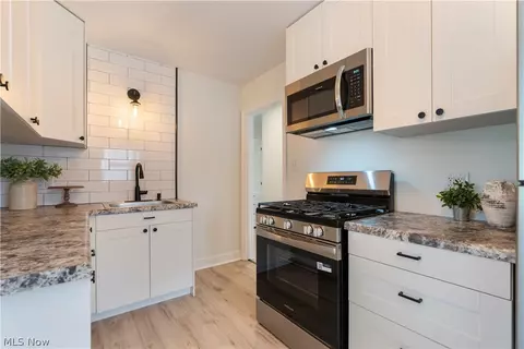 Kitchen - 128 Woolf Ave, Akron, OH 44312 photo 3 of 4