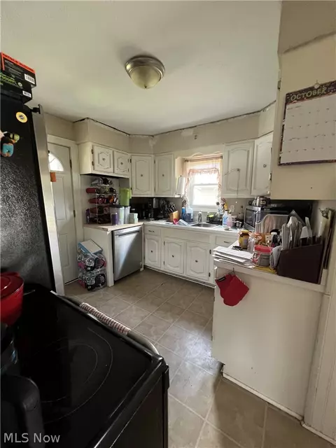 Kitchen - 1891 E 33rd St, Lorain, OH 44055 photo 2 of 3