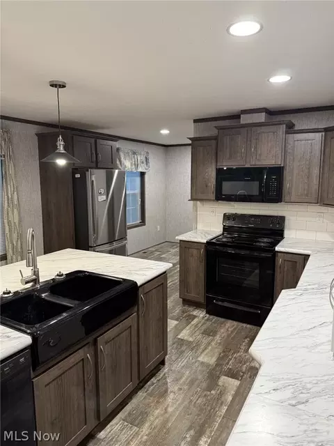 Kitchen - 80 Zero St, Coshocton, OH 43812 photo 2 of 2