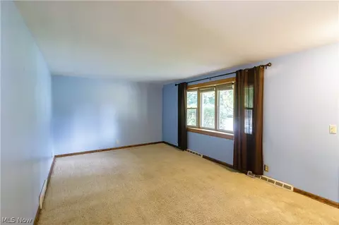 Living - 1416 Dunkeith Dr NW, Canton, OH 44708 photo 3 of 10
