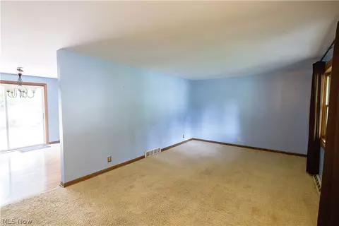 Living - 1416 Dunkeith Dr NW, Canton, OH 44708 photo 5 of 10