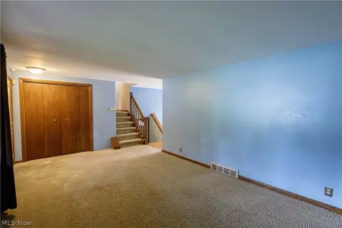 Living - 1416 Dunkeith Dr NW, Canton, OH 44708 photo 4 of 10