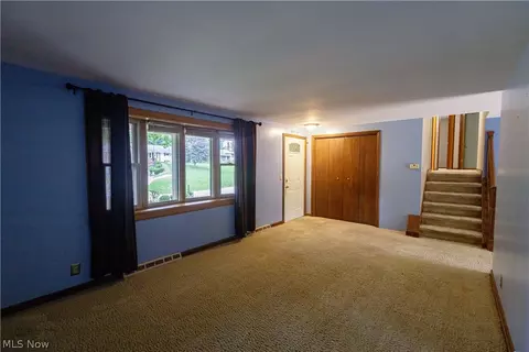 Living - 1416 Dunkeith Dr NW, Canton, OH 44708 photo 6 of 10