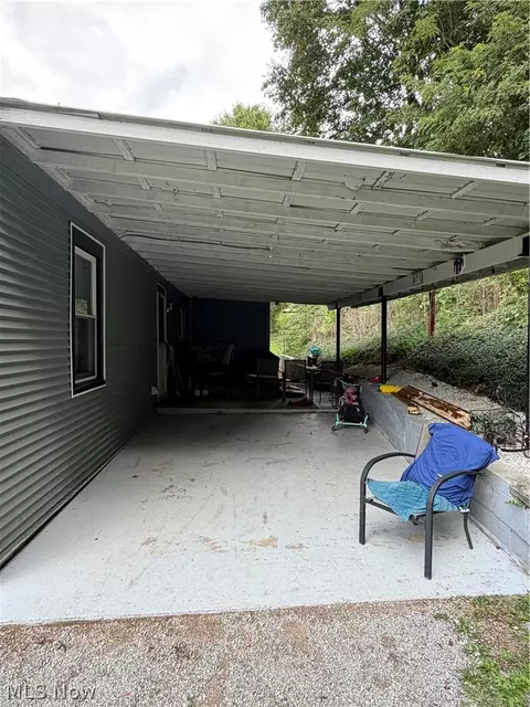 Exterior - 105 School St, Killbuck, OH 44637 photo 3 of 11