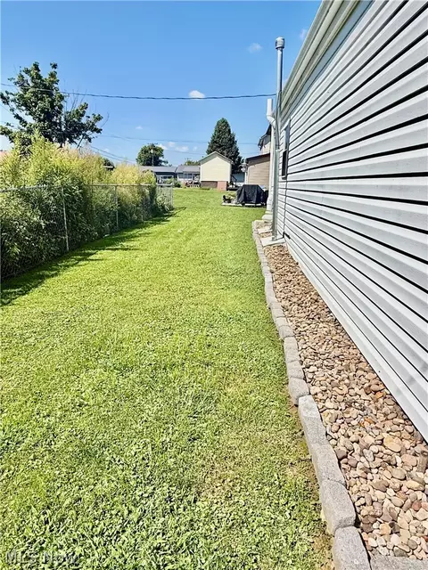 Exterior - 106 Stealey St, Middlebourne, WV 26149 photo 3 of 5
