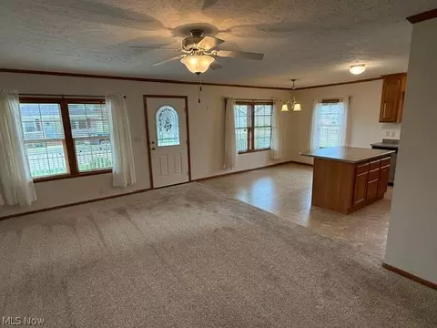 Living - 324 Gemini Dr, Dover, OH 44622 photo 2 of 3