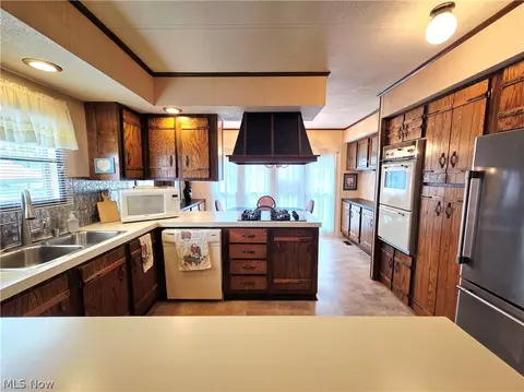 Kitchen - 105 Virginia Ave, Elyria, OH 44035 photo 3 of 3
