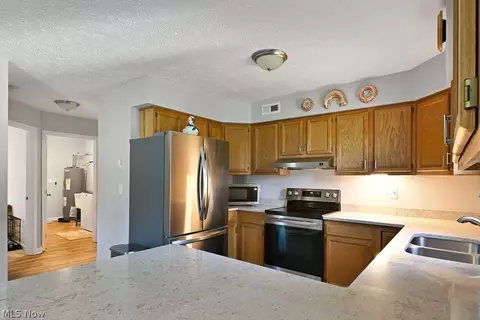 Kitchen - 4052 Pine Dr, Rootstown, OH 44272 photo 2 of 4