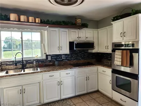Kitchen - 5261 Dailey Rd, New Franklin, OH 44319 photo 1 of 2