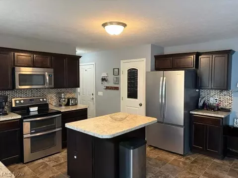 Kitchen - 4916 Julie St, Rootstown, OH 44272 photo 1 of 2