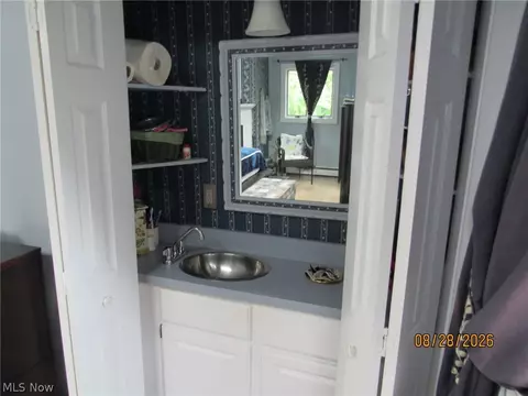 Bath - 1733 E 238th St, Euclid, OH 44117 photo 2 of 4