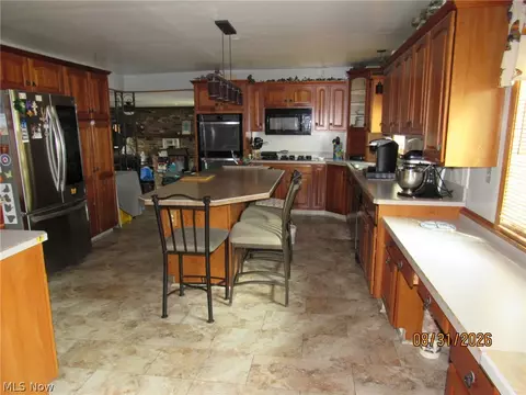 Kitchen - 1733 E 238th St, Euclid, OH 44117 photo 3 of 4