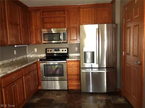 Kitchen - 326 Gemini Dr, Dover, OH 44622 photo 2 of 3
