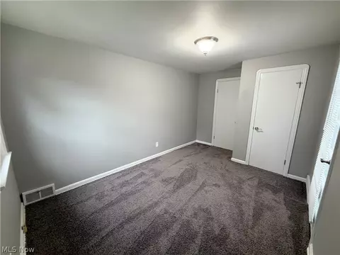 Bedroom - 90 E 207th St, Euclid, OH 44123 photo 4 of 5