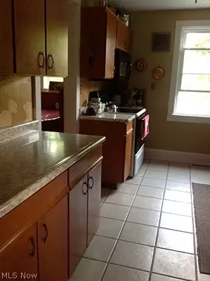 Kitchen - 320 Korman Ave NE, Massillon, OH 44646 photo 2 of 2