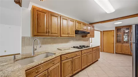 Kitchen - 668 Hazelton St, Masury, OH 44438 photo 2 of 3