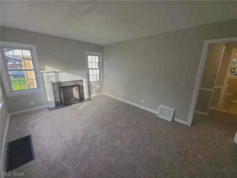 Living - 25 Woolf Ave, Akron, OH 44312 photo 2 of 4