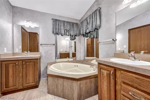 Bath - 557 Chambers Rd, Chardon, OH 44024 photo 1 of 4