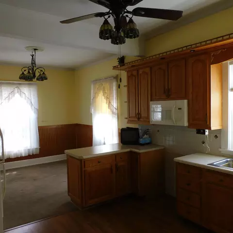 Kitchen - 301 W Main St, Anna, OH 45302 photo 2 of 2