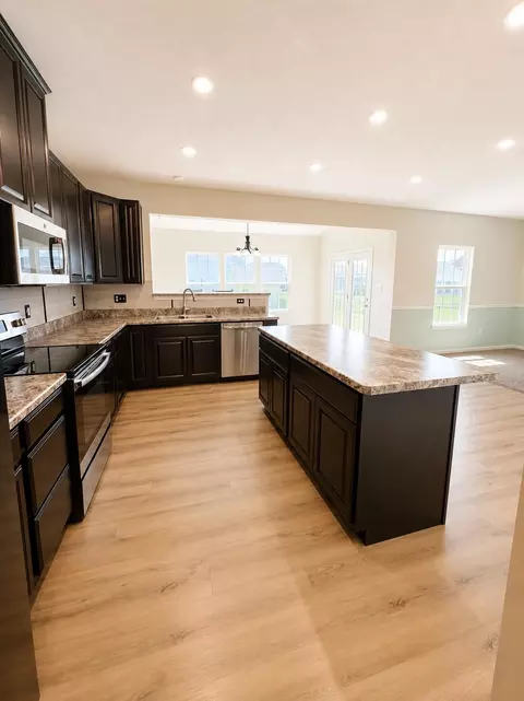Kitchen - 1144 Red Maple Dr, Troy, OH 45373 photo 2 of 4