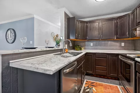 Kitchen - 404 E Walnut St, Anna, OH 45302 photo 2 of 4
