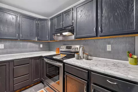 Kitchen - 404 E Walnut St, Anna, OH 45302 photo 3 of 4