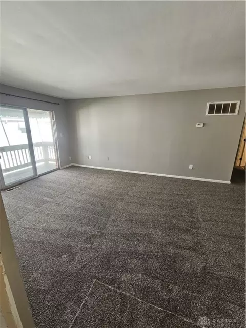 Living - 5710 Coach Dr #E, Dayton, OH 45440 photo 2 of 3