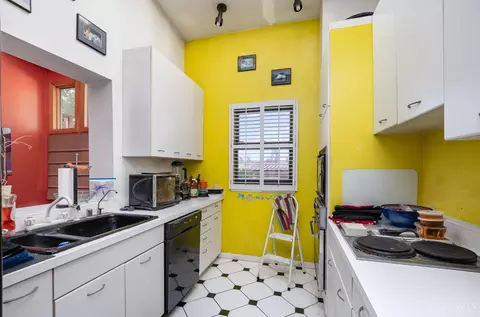Kitchen - 441 Milton St, Cincinnati, OH 45202 photo 2 of 3