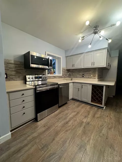 Kitchen - 933 Conca St, Cincinnati, OH 45218 photo 2 of 4