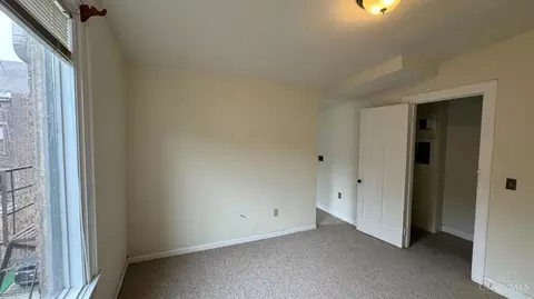 Bedroom - 217 Ninth St, Cincinnati, OH 45202 photo 2 of 2