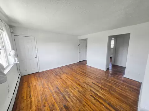 Living - 4720 Ridge Ave, Cincinnati, OH 45209 photo 3 of 11
