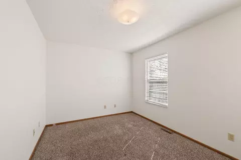 Bedroom - 219 E Arch St, Mansfield, OH 44902 photo 2 of 9