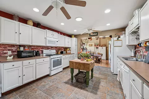 Kitchen - 4711 N Elm Tree Rd, Conover, OH 45317 photo 2 of 7