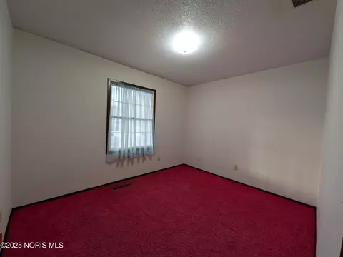 Bedroom - 832 E Graceway Dr, Napoleon, OH 43545 photo 2 of 3