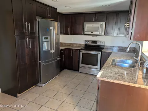 Kitchen - 311 W Rings St, West Unity, OH 43570 photo 3 of 4