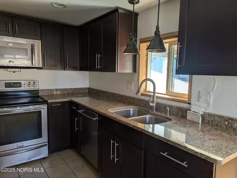 Kitchen - 311 W Rings St, West Unity, OH 43570 photo 2 of 4