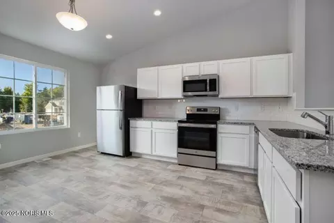 Kitchen - 320 Crabtree Ln, Delta, OH 43515 photo 2 of 3