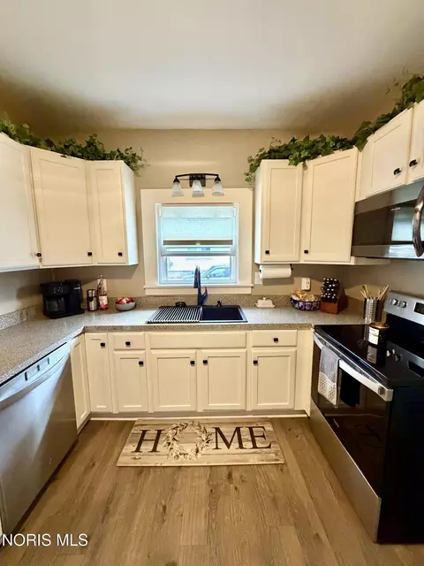 Kitchen - 111 W Wayne St, Paulding, OH 45879 photo 2 of 2