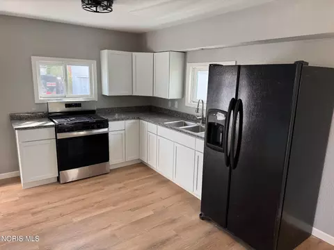 Kitchen - 611 W Jackson St, West Unity, OH 43570 photo 2 of 2