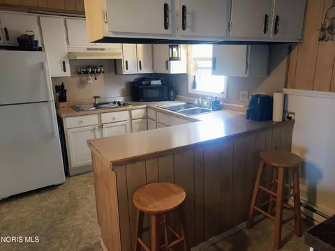Kitchen - 407 E 2nd St, Ottawa, OH 45875 photo 2 of 2