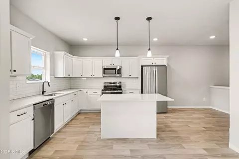 Kitchen - 323 Crabtree Ln, Delta, OH 43515 photo 2 of 2