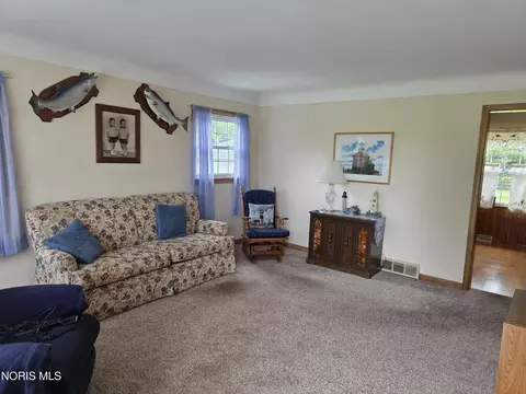 Living - 245 Enos Dr, Oregon, OH 43616 photo 1 of 2