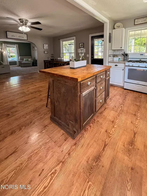 Kitchen - 413 N Adrian St, Lyons, OH 43533 photo 2 of 3
