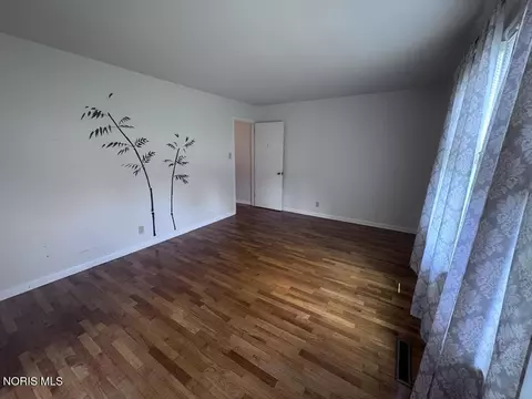 Living - 711 S Simon St, Ada, OH 45810 photo 2 of 3