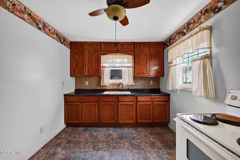 Kitchen - 203 Pleasant St, Edon, OH 43518 photo 2 of 3