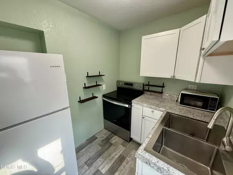 Kitchen - 308 W Jackson St, West Unity, OH 43570 photo 2 of 2