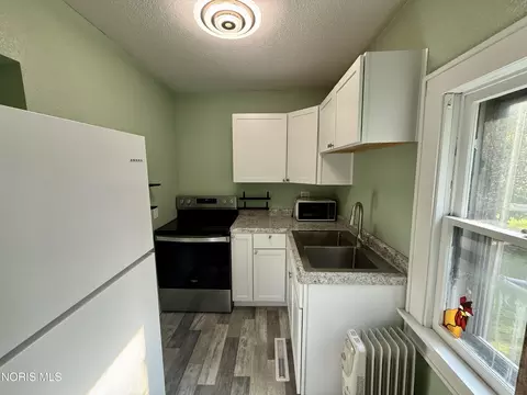 Kitchen - 308 W Jackson St, West Unity, OH 43570 photo 1 of 2