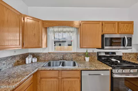 Kitchen - 306 Monroe St, Delta, OH 43515 photo 2 of 3
