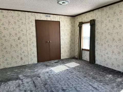 Bedroom - 4601 Williams County Rd 15 Apt Lot #LOT 100, Bryan, OH 43506 photo 2 of 4